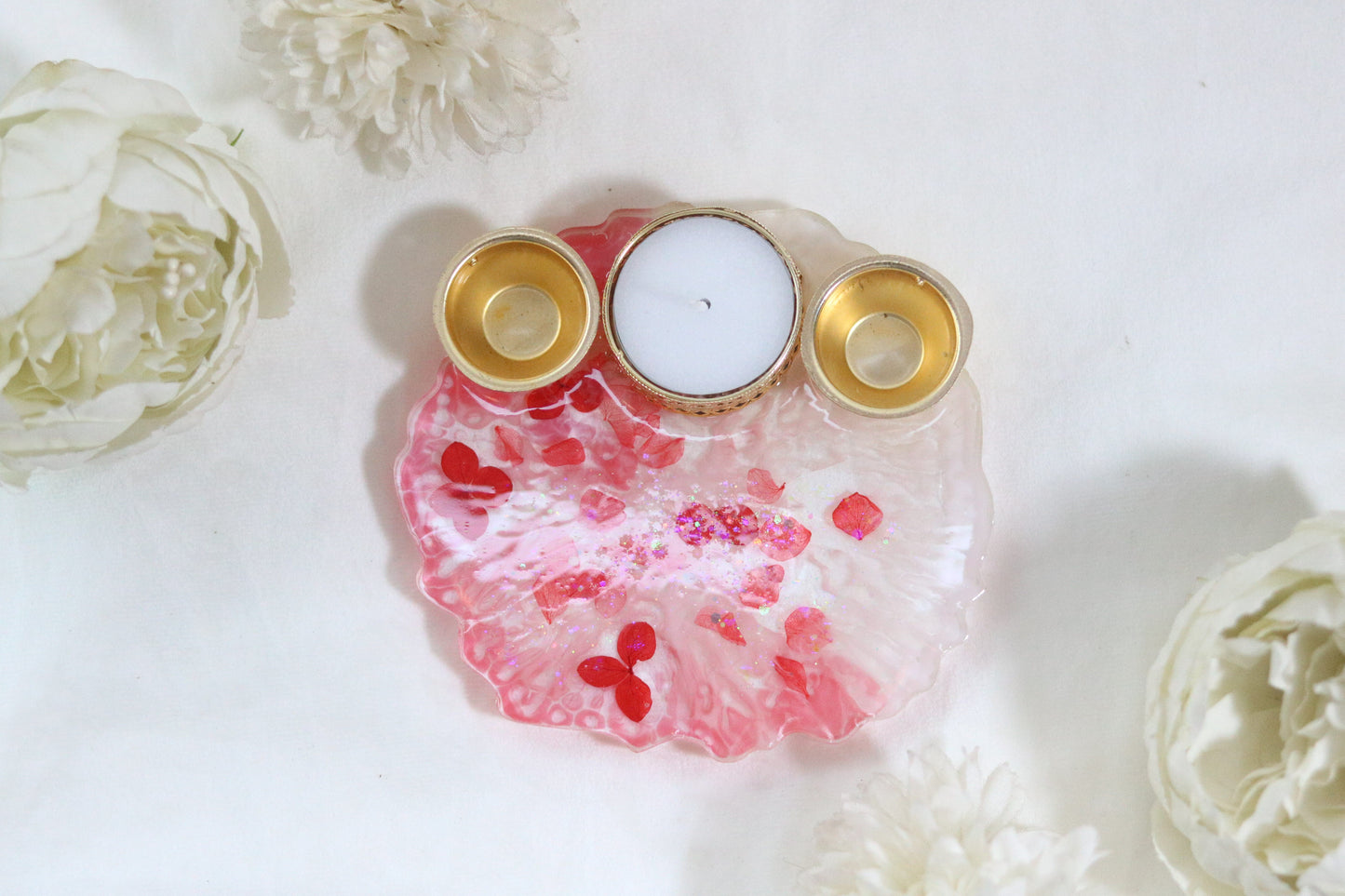 "Resin Pooja Thali with Delicate Floral Accents and Golden Diyas"