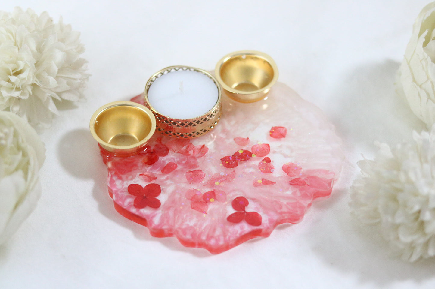 "Resin Pooja Thali with Delicate Floral Accents and Golden Diyas"