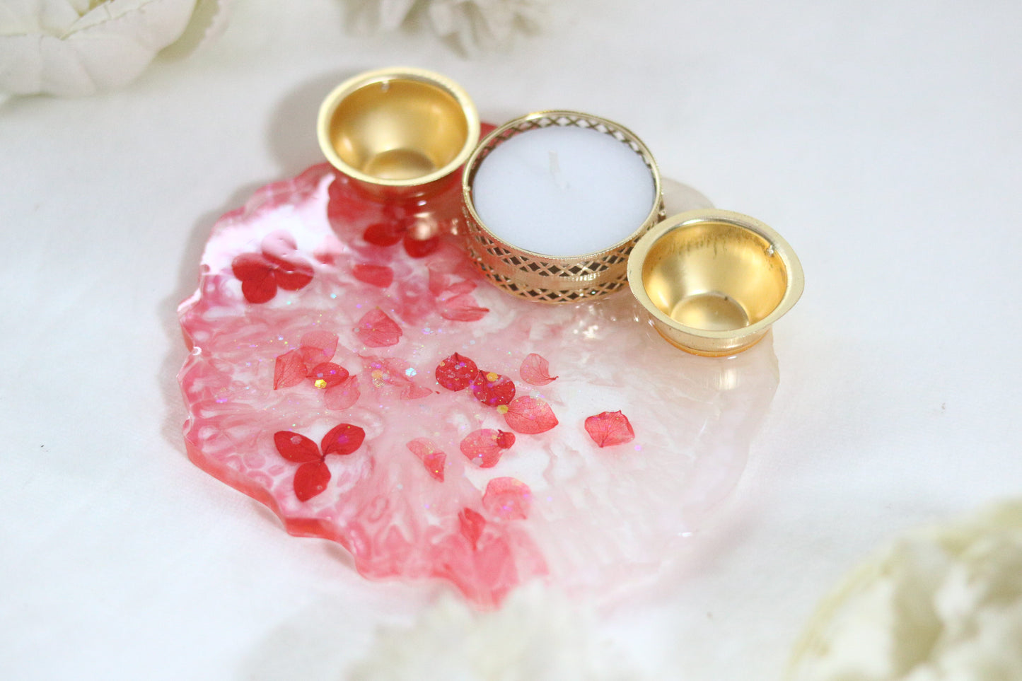 "Resin Pooja Thali with Delicate Floral Accents and Golden Diyas"